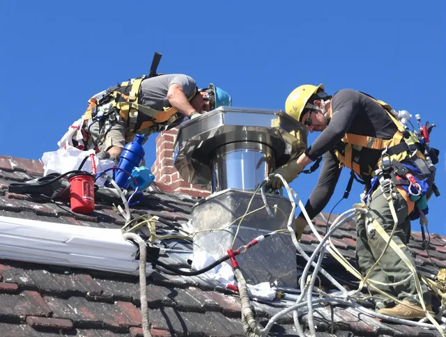 Protective chimney cap installed by Downey Chimney Sweep in Downey, CA