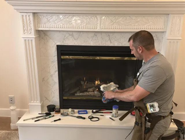 Downey Chimney Sweep performing fireplace maintenance in Downey, CA